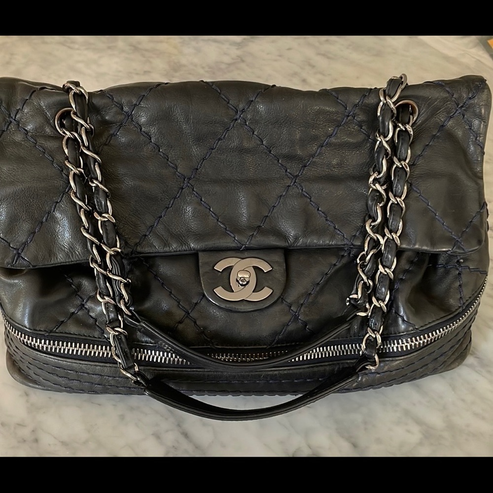 Authentic, expandable Chanel handbag. Navy leather, purchased at Chanel in NYC.